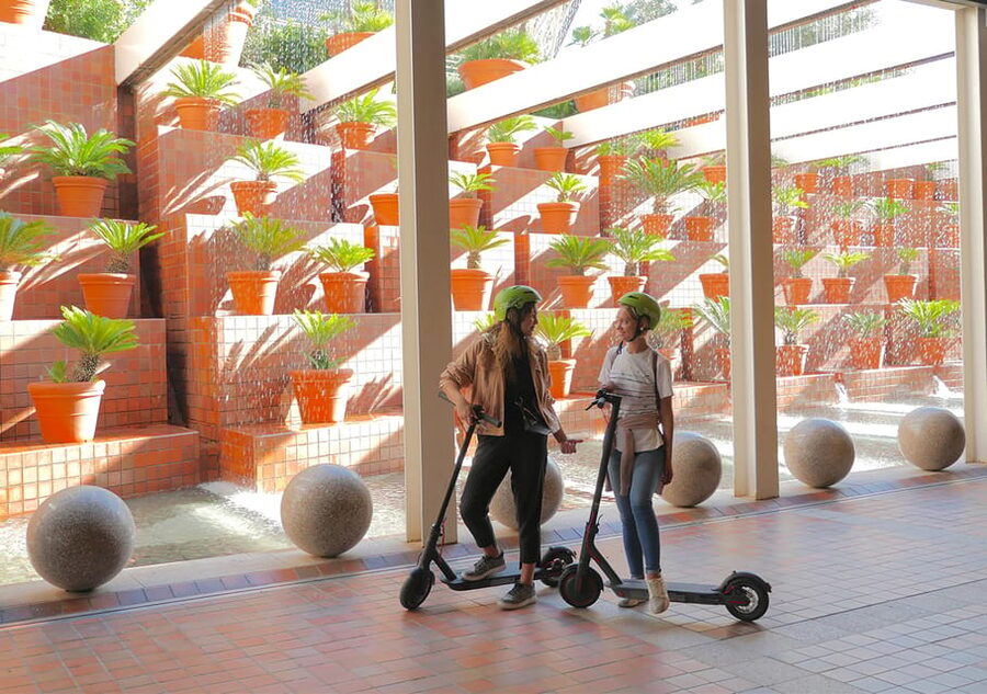Barcelona: Gaudi Highlights Guided Tour by Electric Scooter - Olympic Port to Barceloneta: sea breeze on a scooter