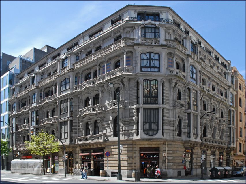 Bilbao: Historical and Architectural Walking Tour - Circular Square area: founder statue, gardens, and the business spine