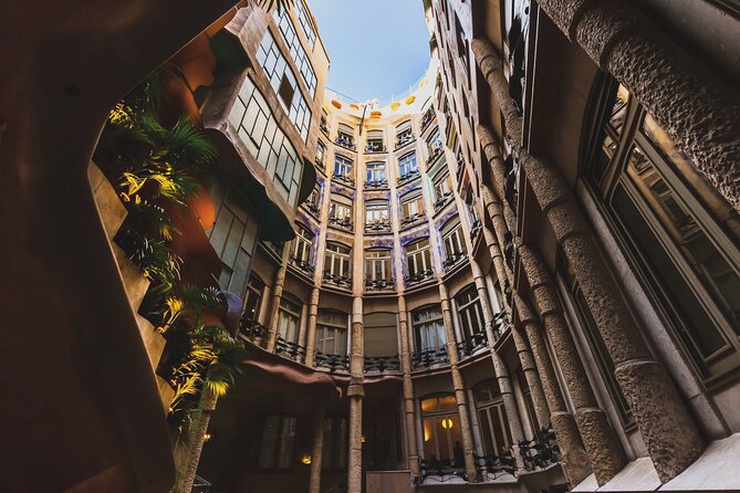 Private Barcelona Bike Tour, Gaudi's Art and Medieval Districts with Local Guide - Royal Square lanterns to Plaza Reial: a Gothic Quarter welcome