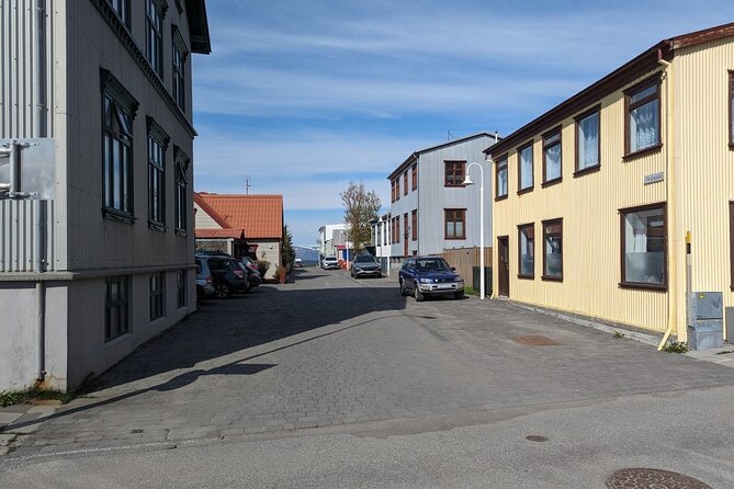 Self-Guided Tour of Ísafjörður: Art, History, and Architecture - Ísafjarðarkirkja: the name story with sun and pancakes