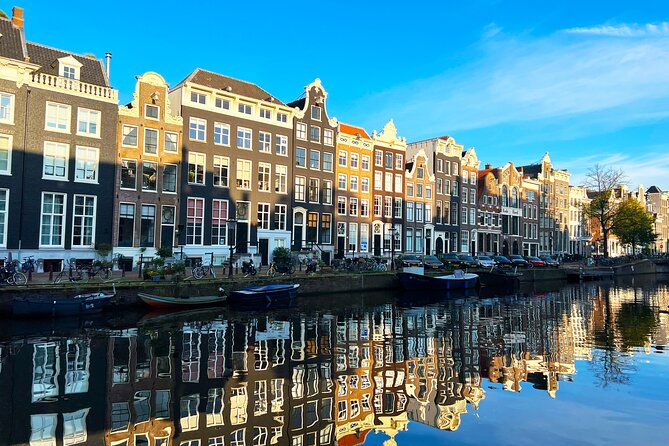 Walking Tour about Golden Age Architecture, private local guide - Royal Palace Amsterdam: from town hall to royal residence